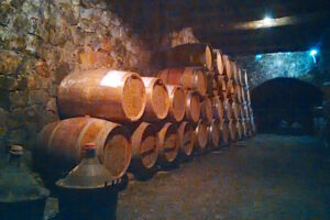 oak barrels in the wine cellar at Dourakis winery